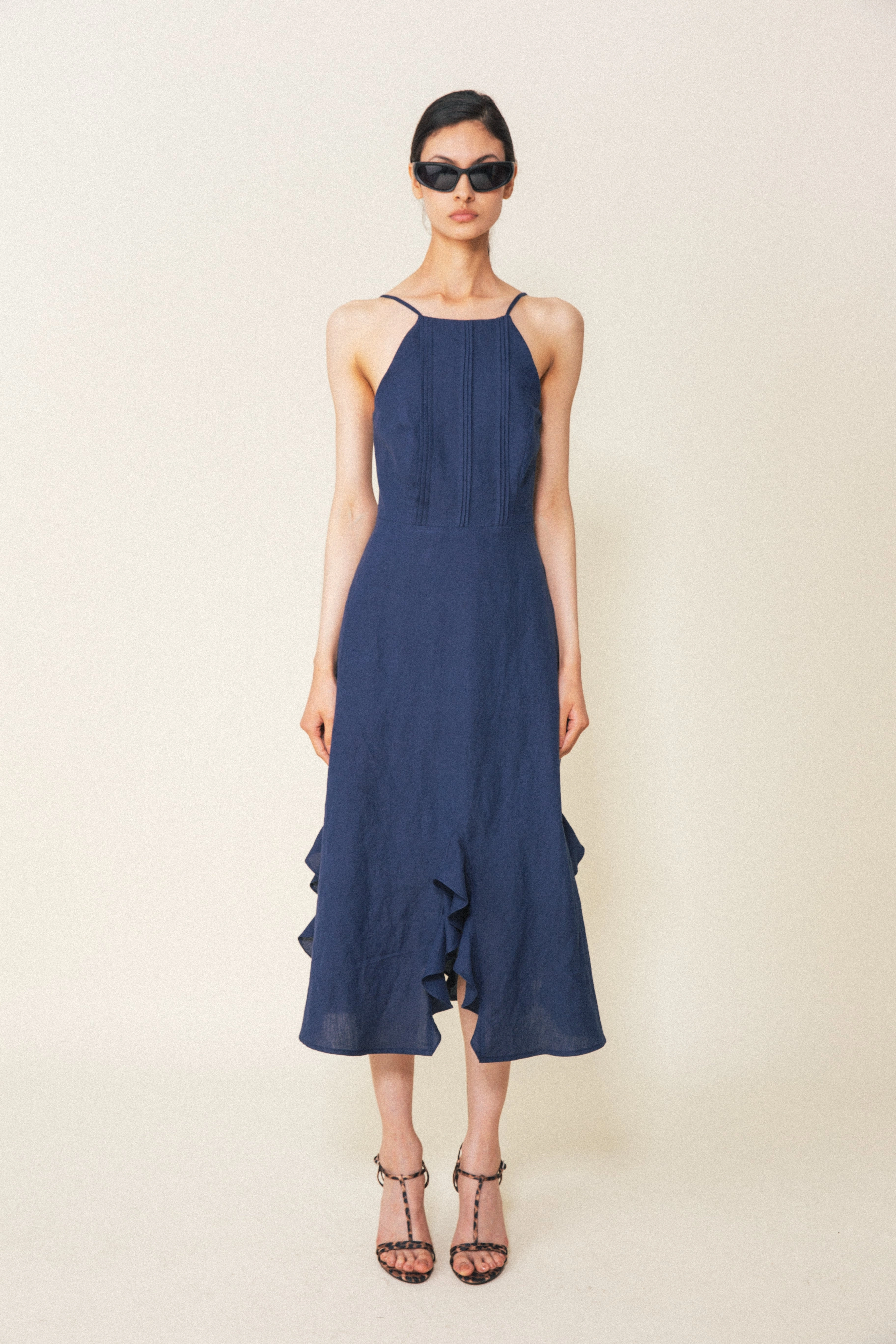 Calypso Halter Ruffle Hem Dress in Navy Knit Cool