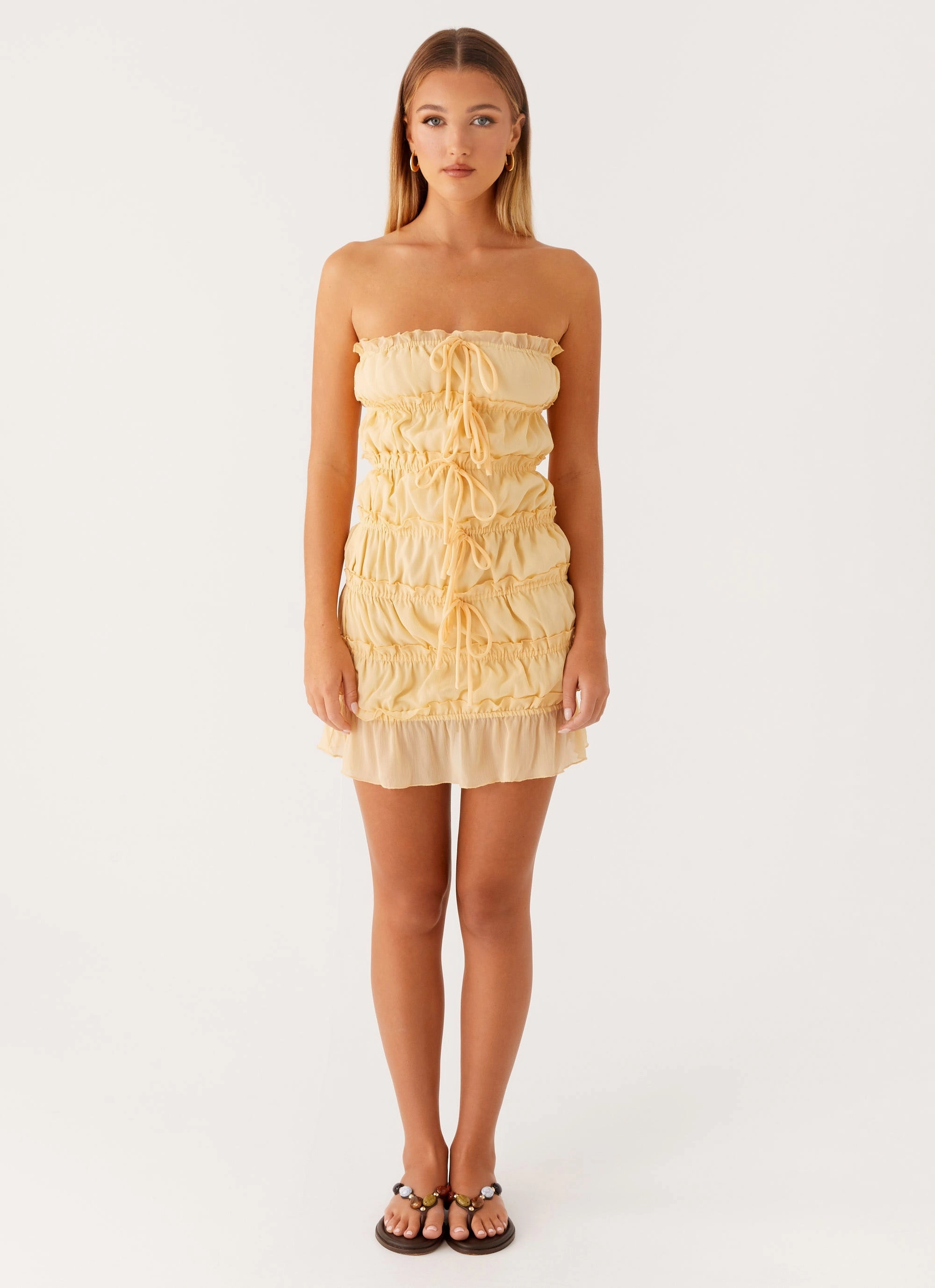 Kylan Mini Dress - Apricot Subtle design